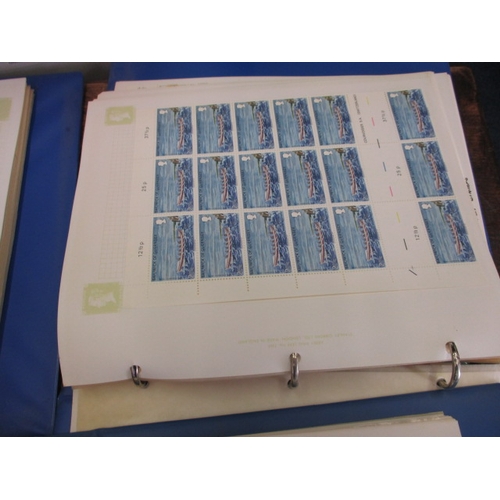 179 - A very large quantity of mainly Guernsey stamps, to include mint examples, part sheets, quads and va... 