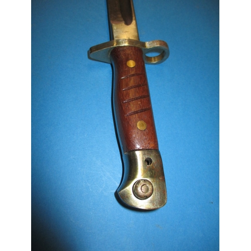 186 - A bayonet and decorative wall hanging axe, in used condition, approx. length 56cm