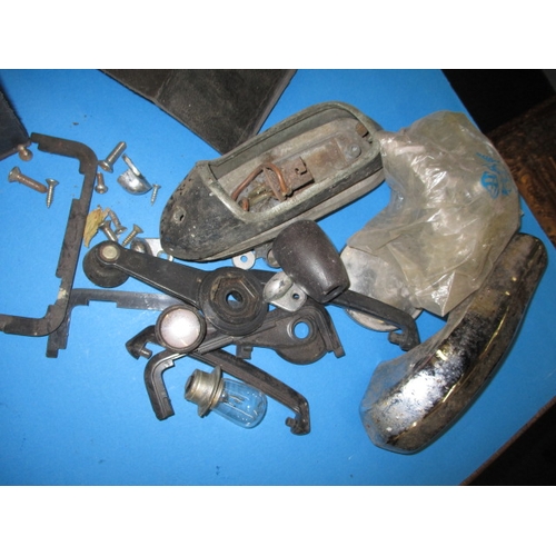 188 - A parcel of vintage automotive spot and fog lamps, and other car spares to include an MG speaker con... 