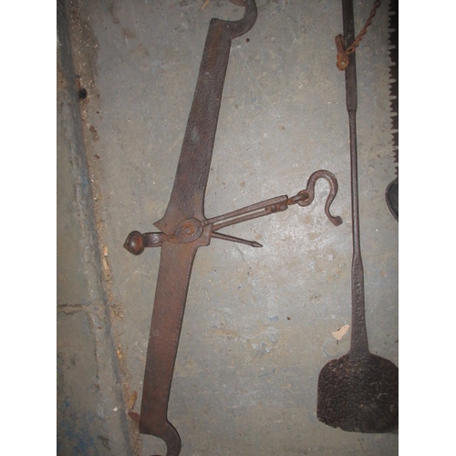 190 - A quantity of antique and later agricultural related tools, to include a large iron balance scale ba... 