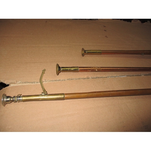 191 - Three copper post horns, some denting and general age-related marks, approx. length of longest 108cm