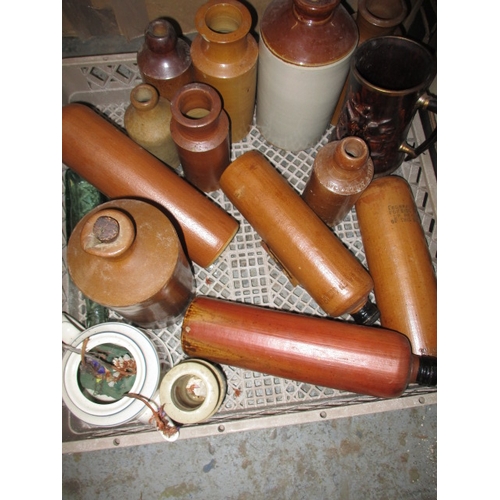 194 - A parcel of stoneware items, to include bottles and crocks, some damages and all in used condition