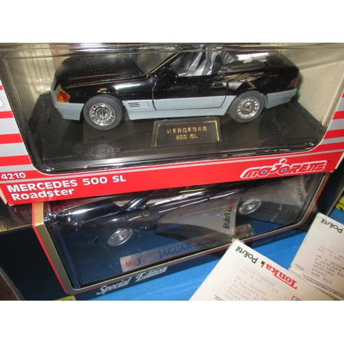 204 - A parcel of Die-cast model vehicles, to include sports cars, most in original boxes and unused