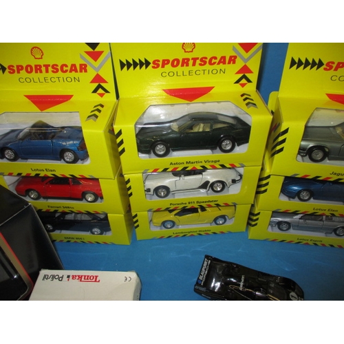 204 - A parcel of Die-cast model vehicles, to include sports cars, most in original boxes and unused