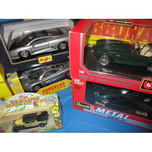 204 - A parcel of Die-cast model vehicles, to include sports cars, most in original boxes and unused