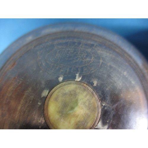 209 - Two lignum vitae wood bowls, in original carry bag, having use related marks