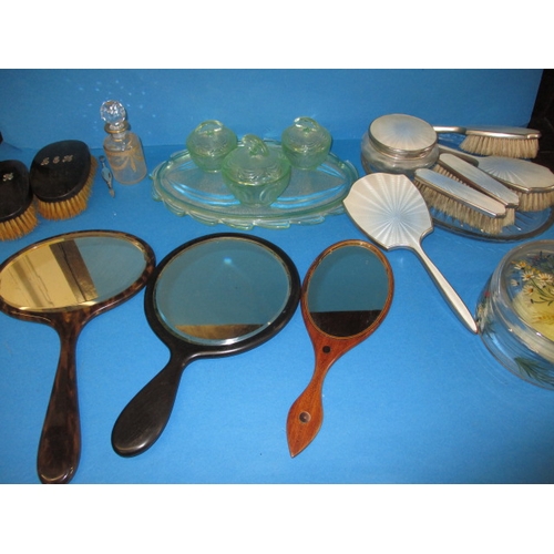 214 - A quantity of vintage dressing table items to include mirrors and brush sets, all in used condition