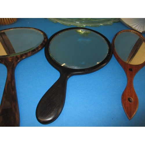 214 - A quantity of vintage dressing table items to include mirrors and brush sets, all in used condition