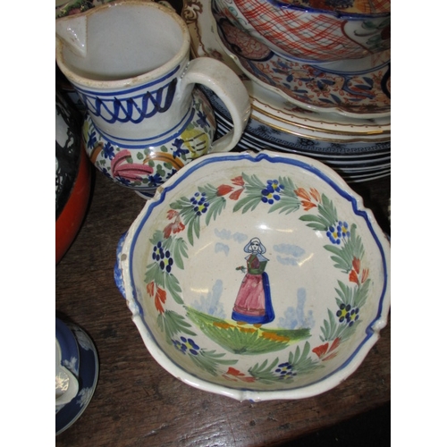 215 - A very large quantity of vintage ceramics, to include cake stands, platters, various makers, all in ... 