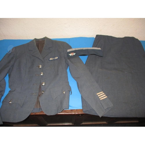 222 - A girls venture corps uniform, jacket, hat and skirt, size 16, dated 1955 and with crows foot mark