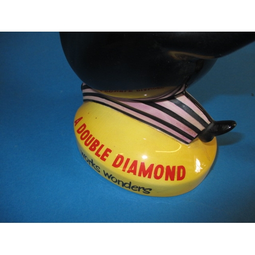 199 - A genuine Beswick Double Diamond running man, having a very small flake to underside of hat rim but ... 