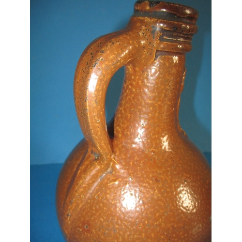 200 - An antique Bellarmine salt glazed stoneware jug, approx. height 23.5cm, in good condition with age-r... 