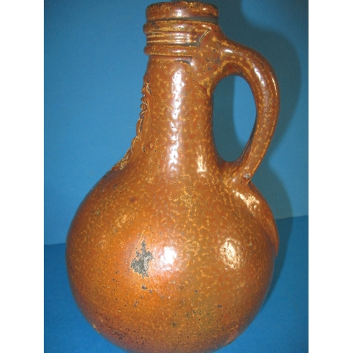 200 - An antique Bellarmine salt glazed stoneware jug, approx. height 23.5cm, in good condition with age-r... 