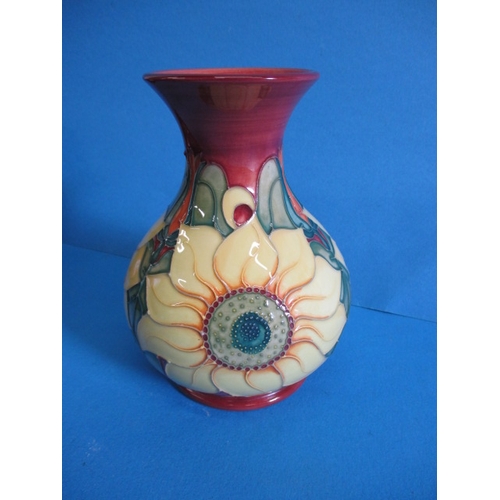 203 - A 1995 Moorcroft trial dry flower vase in the Sun flower design, approx. height 16cm, in good pre-ow... 