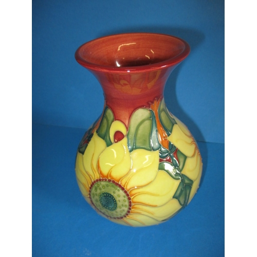 203 - A 1995 Moorcroft trial dry flower vase in the Sun flower design, approx. height 16cm, in good pre-ow... 