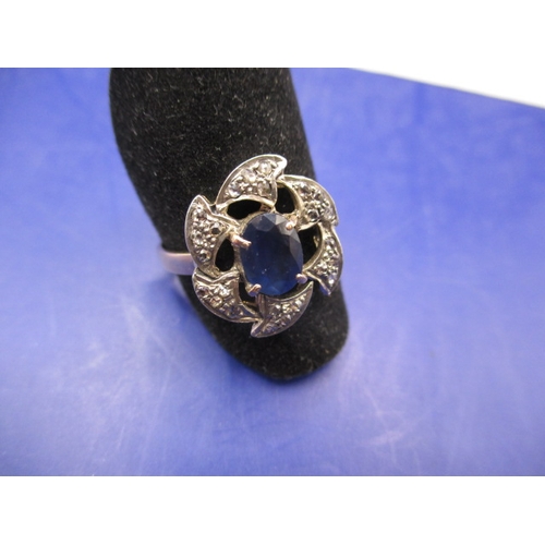 18 - An antique yellow gold and silver dress ring, having rose cut diamonds and central sapphire, approx.... 