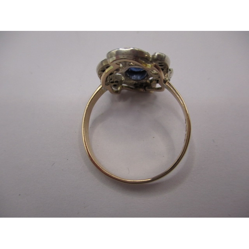 18 - An antique yellow gold and silver dress ring, having rose cut diamonds and central sapphire, approx.... 