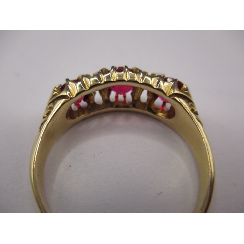 19 - A vintage 18ct yellow gold dress ring with diamonds and red stones, approx. ring size ‘P’, approx. w... 