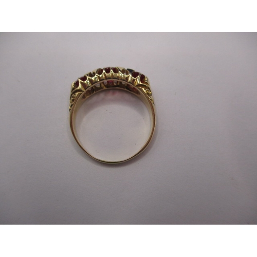 19 - A vintage 18ct yellow gold dress ring with diamonds and red stones, approx. ring size ‘P’, approx. w... 