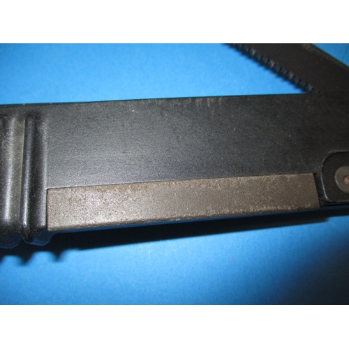 221 - An unused SA80 Bayonet and sheath, having wire cutter, saw blade and sharpening stone, in good pre-o... 