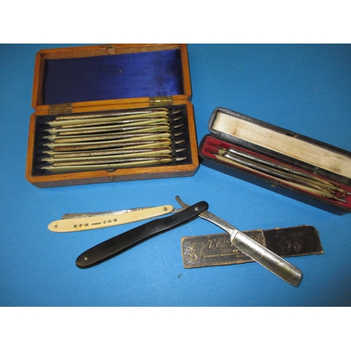 A parcel of vintage cut throat razors, to include a boxed set with days of the week on, all in well used condition