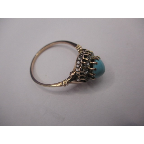 22 - An early 19th century gold ring with central cabochon turquoise stone, approx. ring size ‘Q+’, appro... 