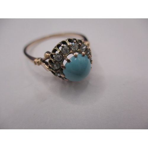 22 - An early 19th century gold ring with central cabochon turquoise stone, approx. ring size ‘Q+’, appro... 