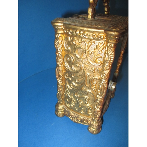 232 - A vintage gilt metal carriage clock, striking on a bell, age-related marks and no key so not tested ... 