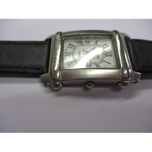 121 - A vintage ‘Tank’ wristwatch, in current working order with use-related marks