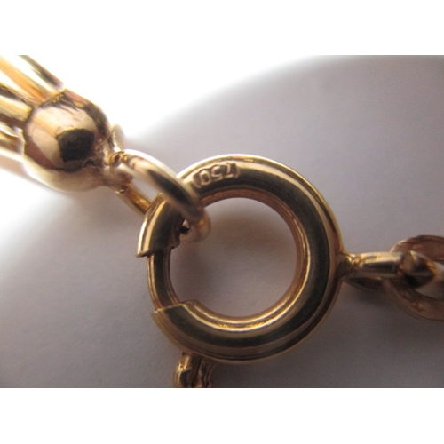 64 - A 750 yellow gold bracelet, in pre-owned condition with working clasp, approx. weight 10g