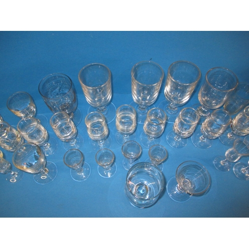 289 - A large quantity of antique and later drinking glasses, various dates and styles, all in used condit... 