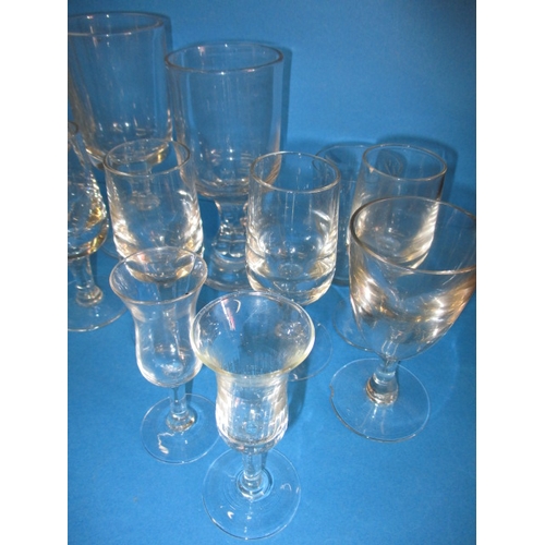 289 - A large quantity of antique and later drinking glasses, various dates and styles, all in used condit... 