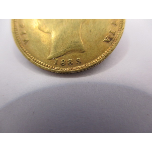 124 - A Victorian young head gold half sovereign, dated 1883, having shield type back and in circulated co... 