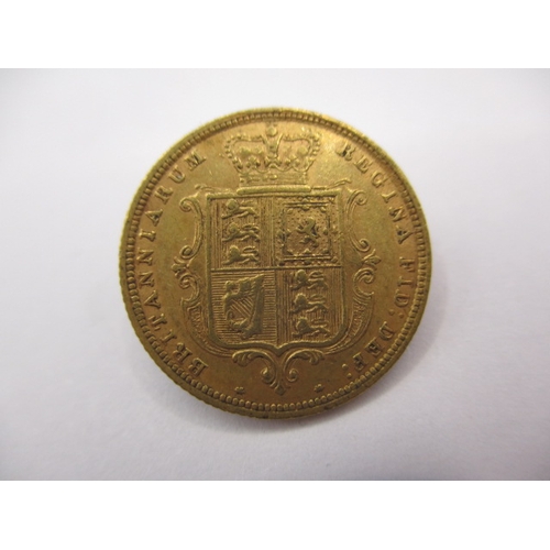 124 - A Victorian young head gold half sovereign, dated 1883, having shield type back and in circulated co... 