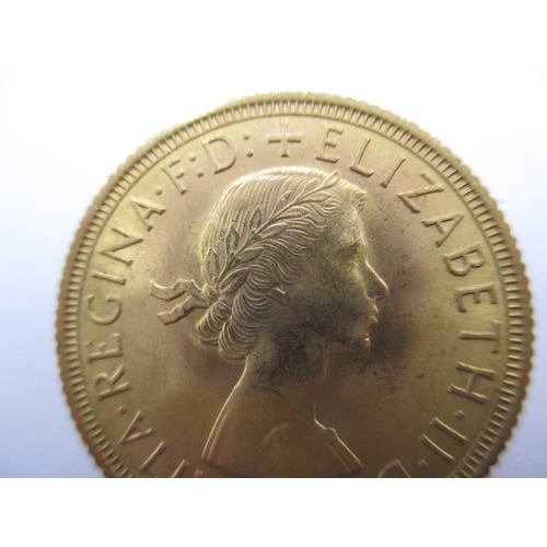 126 - An Elizabeth II full gold sovereign dated 1958, in near uncirculated condition with very good defini... 