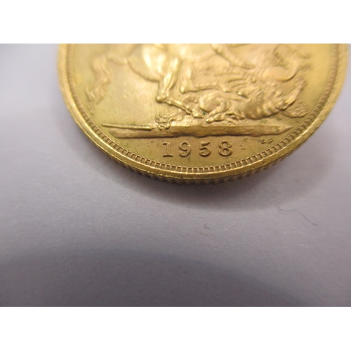 126 - An Elizabeth II full gold sovereign dated 1958, in near uncirculated condition with very good defini... 