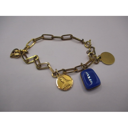 65 - An  18ct yellow gold charm bracelet, with 18ct charms, approx. gross weight 11.5g, in used condition... 