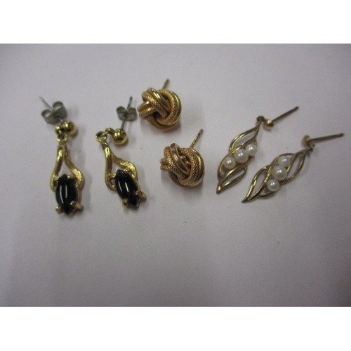 67 - Three pairs of gold and yellow metal earrings, approx. parcel weight 6.5g, all in used condition