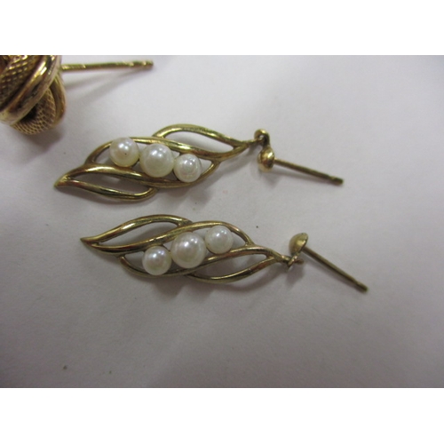 67 - Three pairs of gold and yellow metal earrings, approx. parcel weight 6.5g, all in used condition