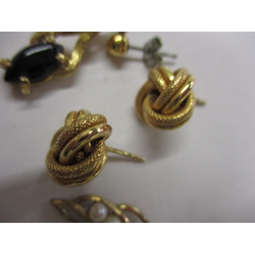 67 - Three pairs of gold and yellow metal earrings, approx. parcel weight 6.5g, all in used condition