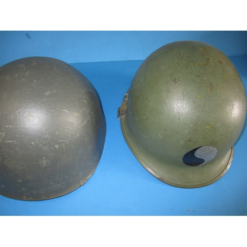 217 - A WWII Dutch? Army helmet, in well used condition