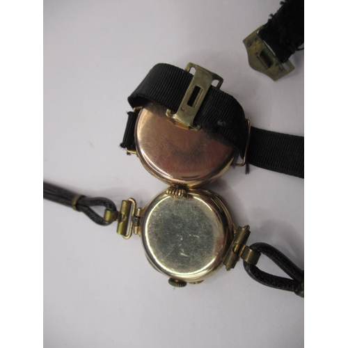 114 - Two 9ct gold cased wristwatches and 2 other examples, all in used condition and not tested as to fun... 