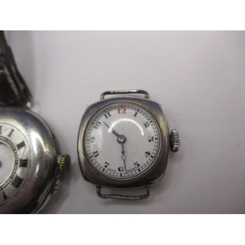 114 - Two 9ct gold cased wristwatches and 2 other examples, all in used condition and not tested as to fun... 