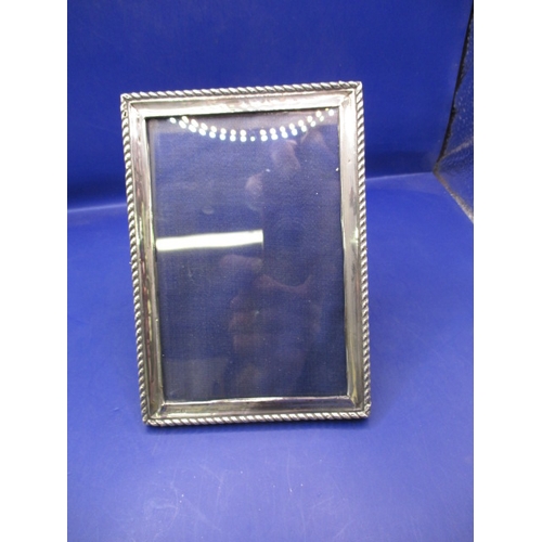 A vintage sterling silver photo frame, approx. size 15x10cm, in good pre-owned condition