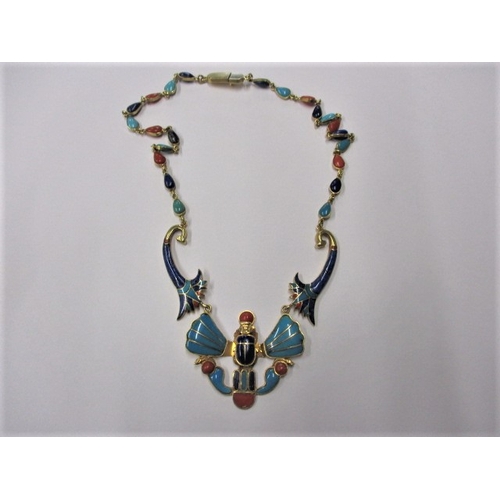 69 - An Egyptian gold and enamel pharaonic jewellery necklace,  assay marked in several places 18ct?, app... 