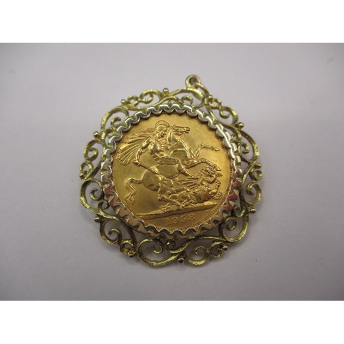 127 - A Queen Elizabeth II gold sovereign, dated 1958 in yellow metal mount, approx. gross parcel weight 1... 