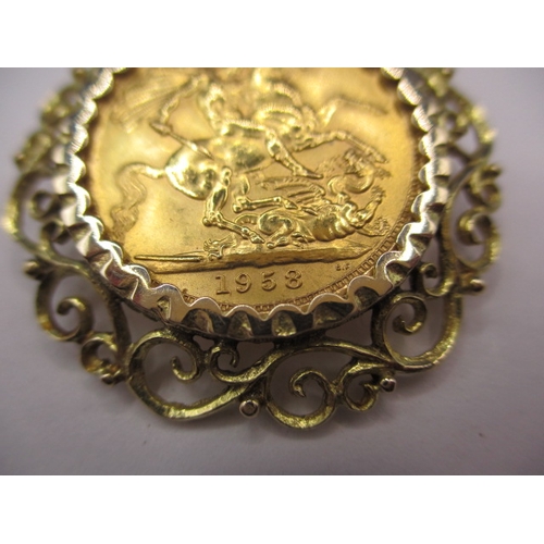 127 - A Queen Elizabeth II gold sovereign, dated 1958 in yellow metal mount, approx. gross parcel weight 1... 