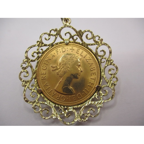 127 - A Queen Elizabeth II gold sovereign, dated 1958 in yellow metal mount, approx. gross parcel weight 1... 