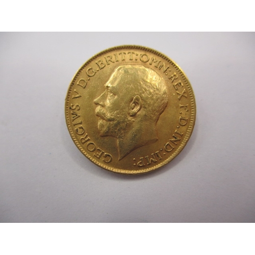 128 - A George V gold sovereign ,dated 1911, a circulated coin with good definition of features