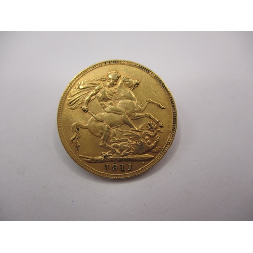 128 - A George V gold sovereign ,dated 1911, a circulated coin with good definition of features